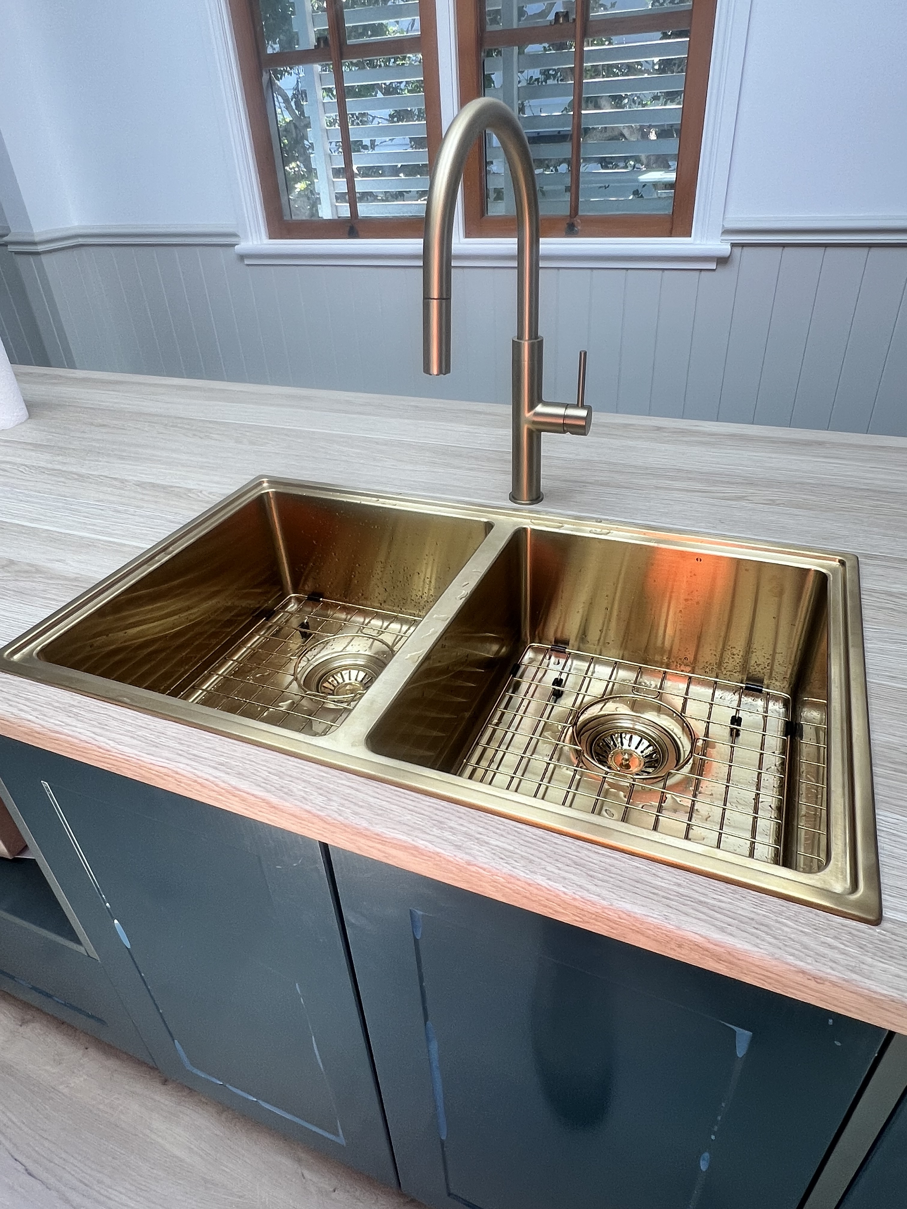 Premium brushed-gold double kitchen sink installation