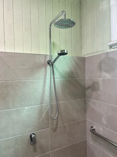 Chrome rain shower and hand shower installation