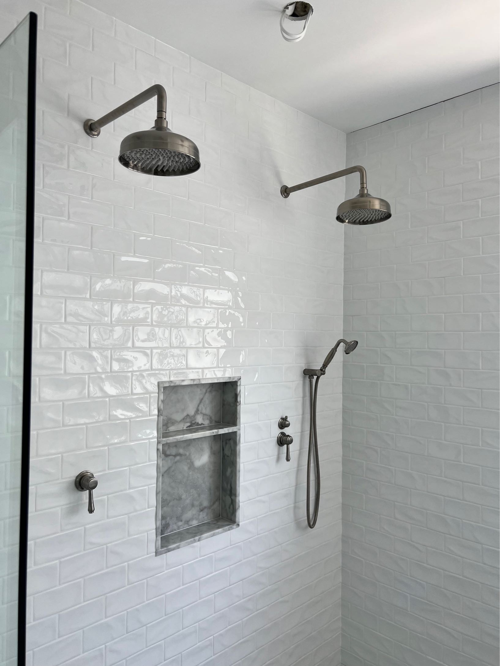 Dual rain shower head installation by McFarland Plumbing Services